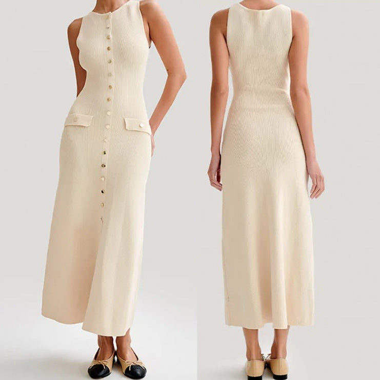 A woman wears a sleeveless, cream-colored ribbed knit midi dress featuring a high neckline, a full front placket of gold-tone buttons, and two small flap pockets at the hips.