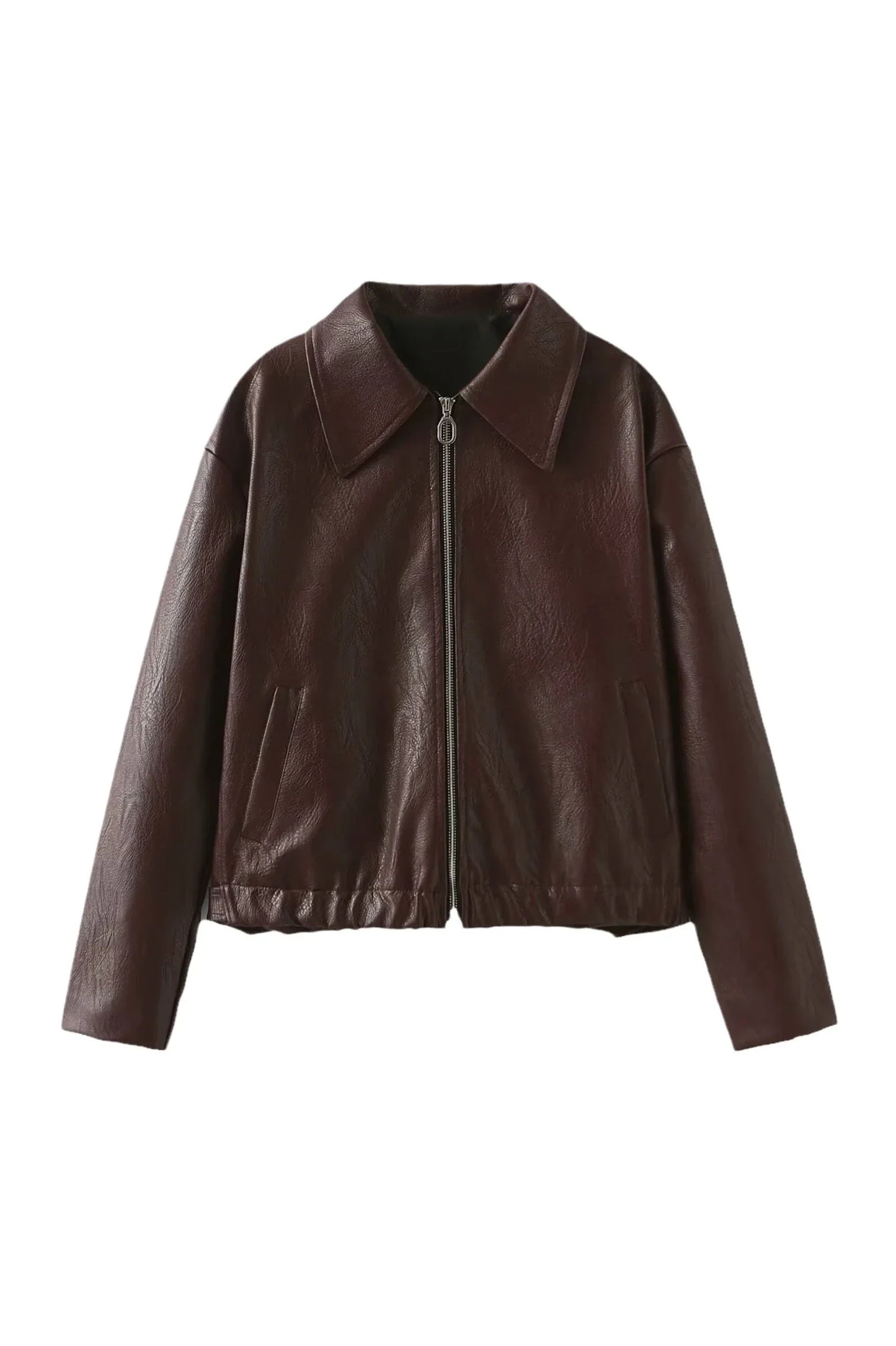Amaranth - A woman wearing an oversized, deep burgundy faux leather zip-up jacket with a classic collar, styled over a black top and dark denim.