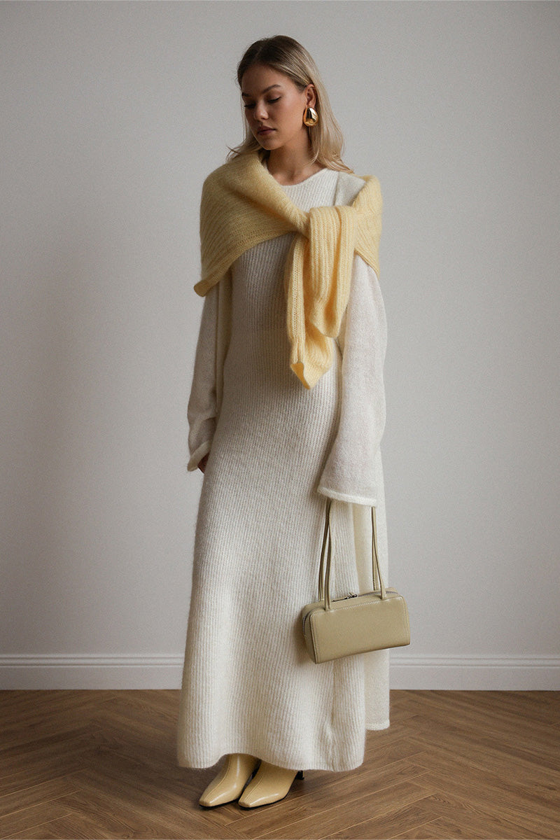 White - A woman modeling a fuzzy white ribbed knit maxi dress paired with a matching longline duster cardigan, showcasing a sleek and elegant winter silhouette.