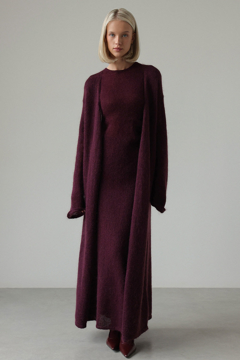 Red - A woman modeling a fuzzy white ribbed knit maxi dress paired with a matching longline duster cardigan, showcasing a sleek and elegant winter silhouette.