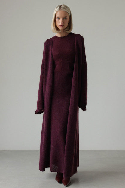 Red - A woman modeling a fuzzy white ribbed knit maxi dress paired with a matching longline duster cardigan, showcasing a sleek and elegant winter silhouette.