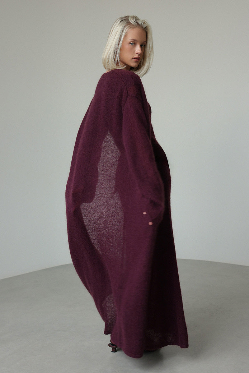 Red - A woman modeling a fuzzy white ribbed knit maxi dress paired with a matching longline duster cardigan, showcasing a sleek and elegant winter silhouette.