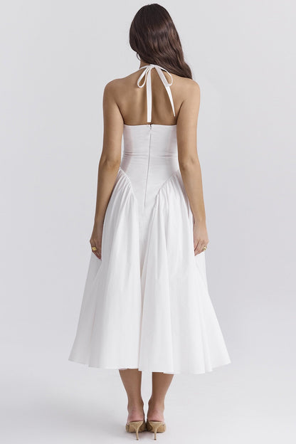 White - A woman models a white sleeveless midi dress with a deep V-neck halter top, a fitted bodice, and a full, gathered A-line skirt, against a plain white background.