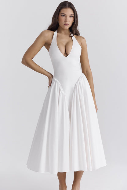 White - A woman models a white sleeveless midi dress with a deep V-neck halter top, a fitted bodice, and a full, gathered A-line skirt, against a plain white background.