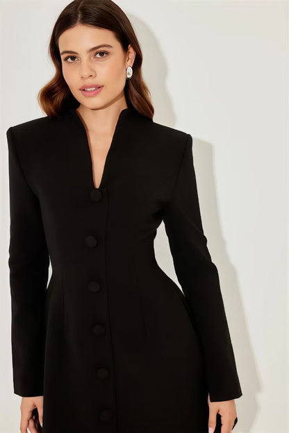 Black - A woman models a long-sleeve, black mini blazer dress with a high split funnel neck, structured shoulders, and a single-breasted button front against a plain white background.