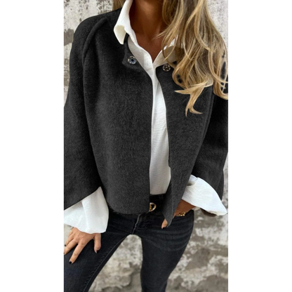 Black - Women's taupe brushed knit cropped cardigan with wide sleeves and top button details, layered over a white button-down shirt and dark denim.