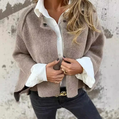 Red - Women's taupe brushed knit cropped cardigan with wide sleeves and top button details, layered over a white button-down shirt and dark denim.