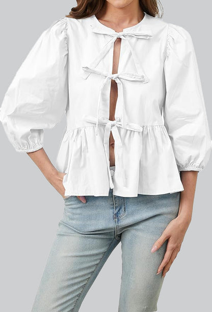 White - Women's crisp white blouse featuring a split front with three bow ties, voluminous 3/4 length puff sleeves, and a gathered peplum hem.