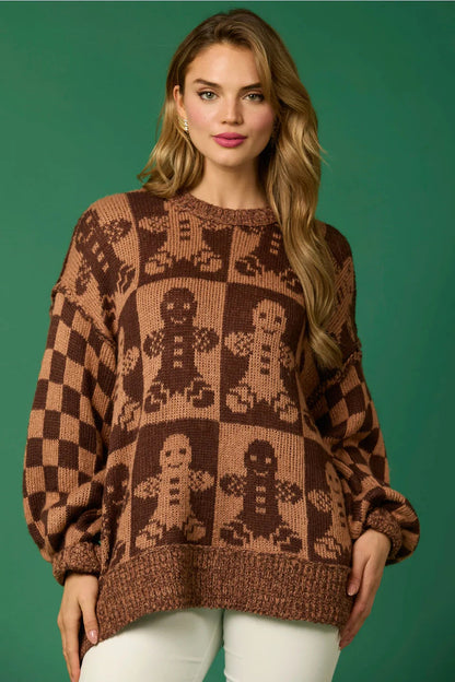 Brown - Women's oversized knit jumper featuring a festive red and white candy cane and checkerboard pattern, styled with drop shoulders and a crew neckline.