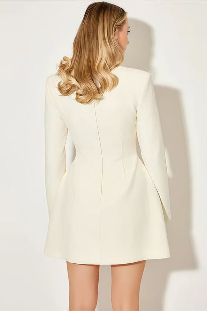 White - A woman models a long-sleeve, black mini blazer dress with a high split funnel neck, structured shoulders, and a single-breasted button front against a plain white background.