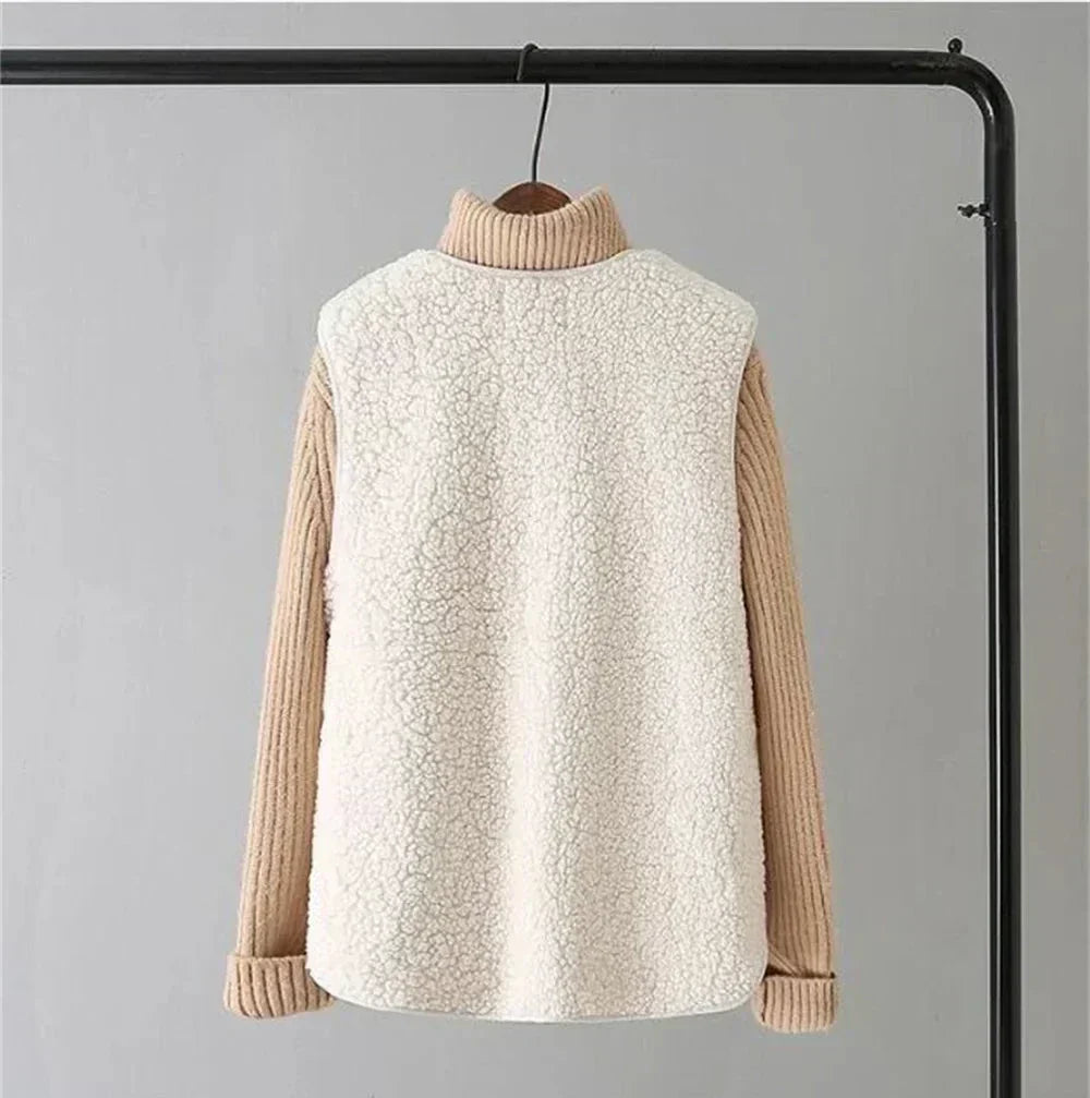 Brown - Three women's faux shearling vests in cream, dark brown, and taupe hanging on wooden hangers, featuring a V-neck, button-front closure, and large patch pockets.