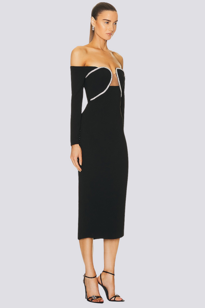 Woman in black knit off-the-shoulder midi dress with rhinestone trim