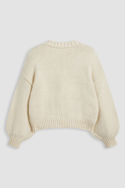 Apricot - Women's chunky knit V-neck cardigan featuring large front buttons and playful 3D crochet cherry appliqués scattered across a relaxed silhouette.