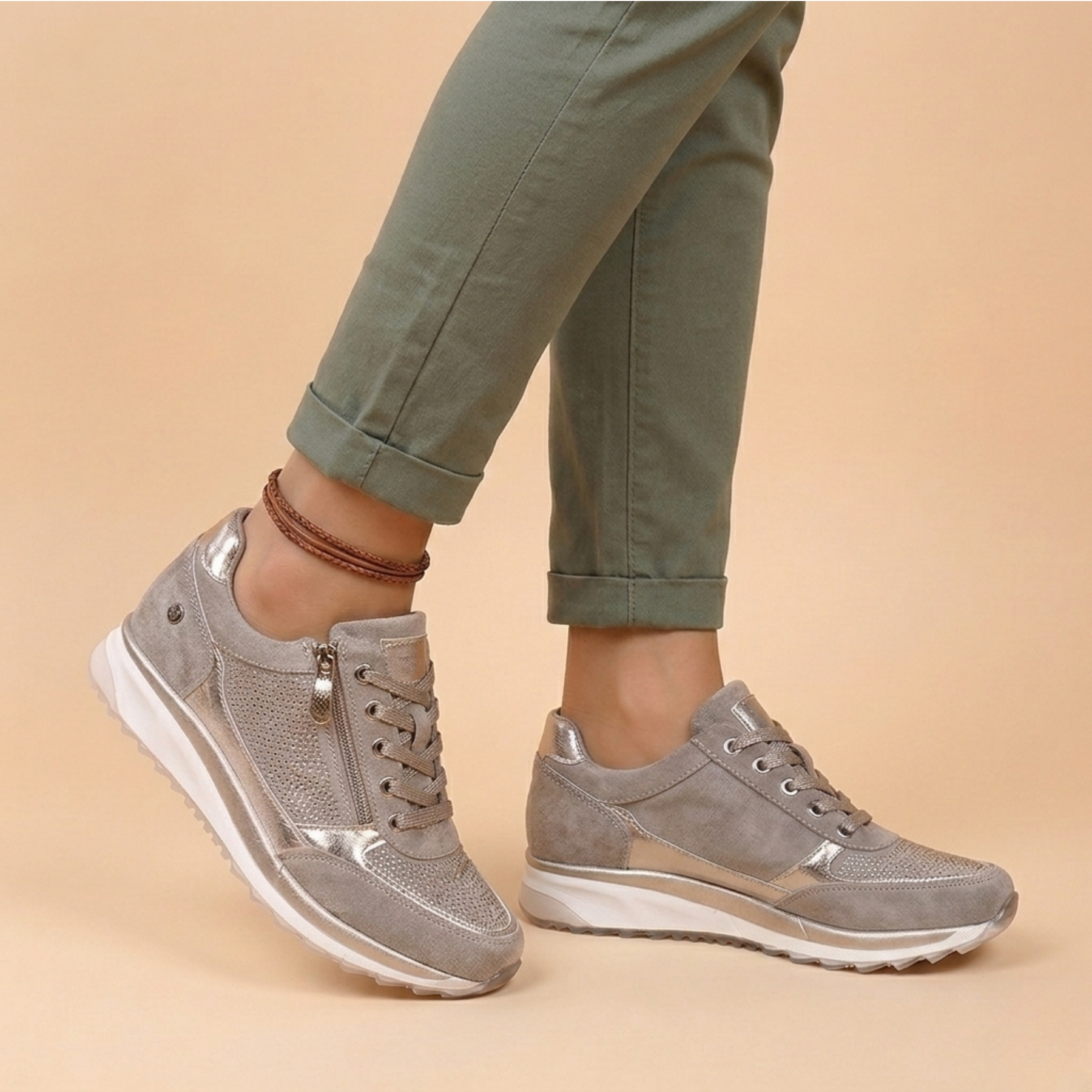 Khaki - Women's cuffed slim-leg pants in a smooth woven fabric, styled with metallic and perforated side-zip sneakers.