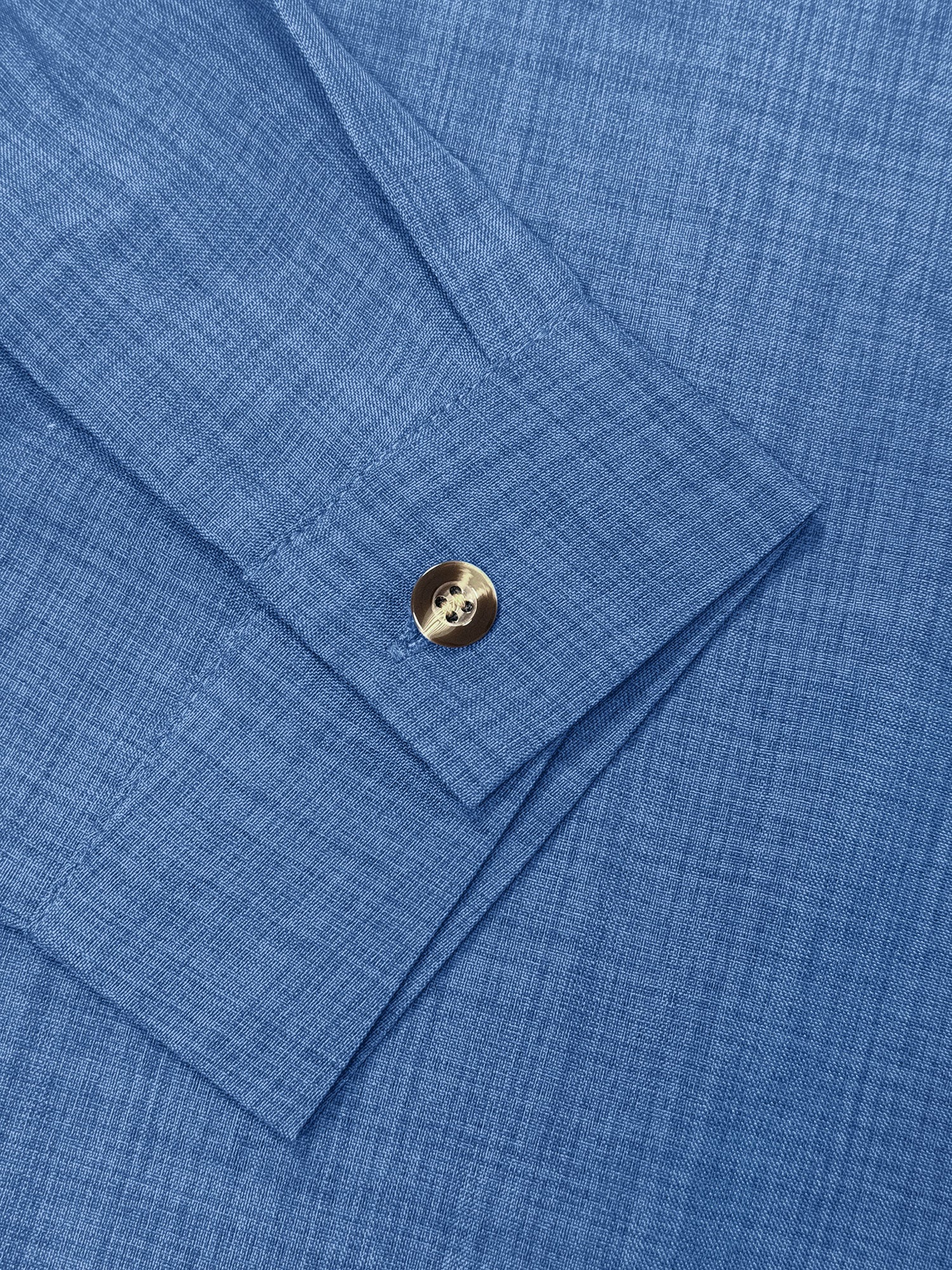 Blue - Women's light green long-sleeve button-down blouse with a collar and textured weave, styled tucked into white trousers.