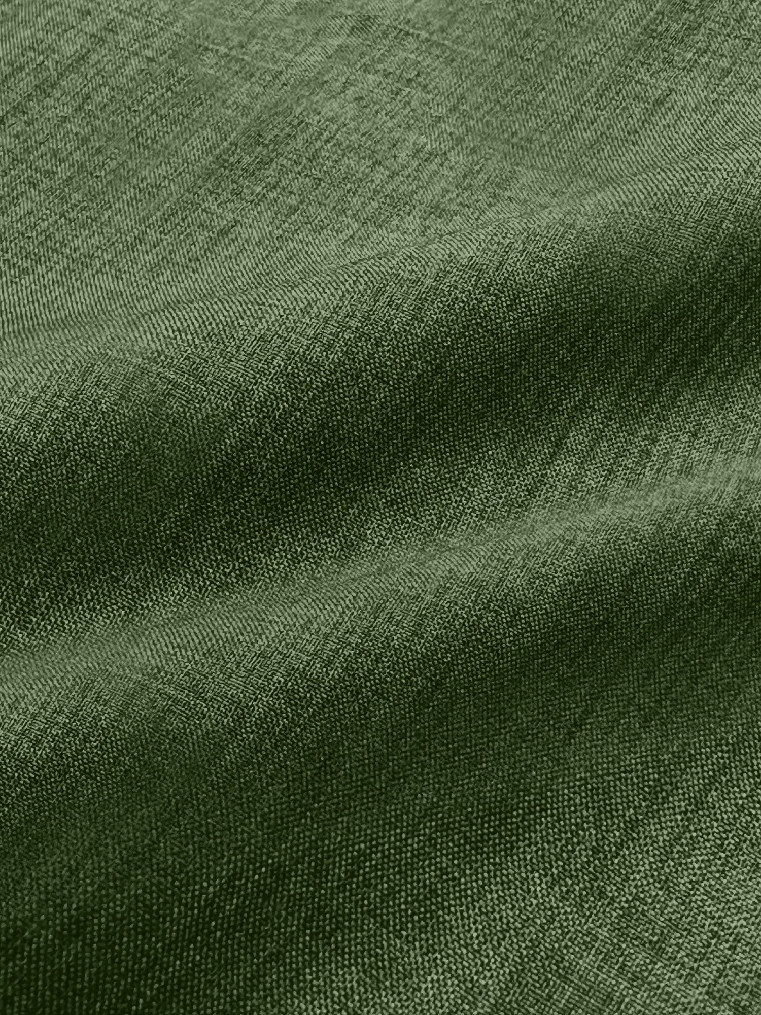 Green - Women's light green long-sleeve button-down blouse with a collar and textured weave, styled tucked into white trousers.