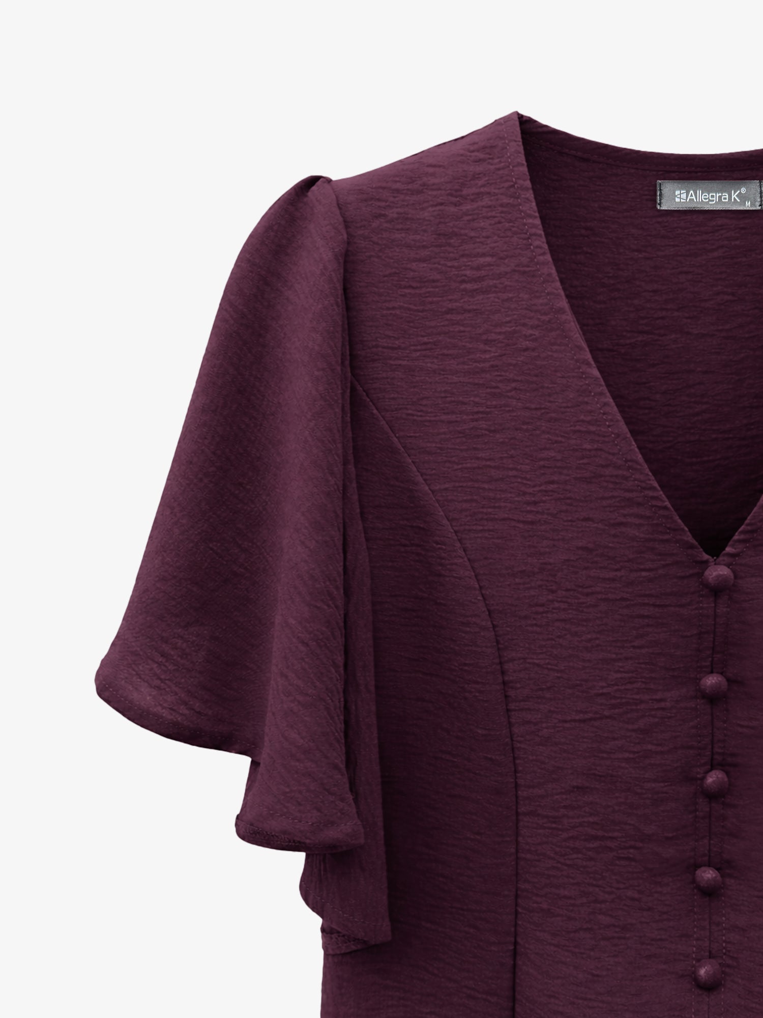 Dark Red - Women's rust orange short flutter sleeve blouse featuring a V-neckline, fabric-covered button front, and a tailored peplum waist, styled with blue jeans.