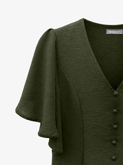 Army Green - Women's rust orange short flutter sleeve blouse featuring a V-neckline, fabric-covered button front, and a tailored peplum waist, styled with blue jeans.