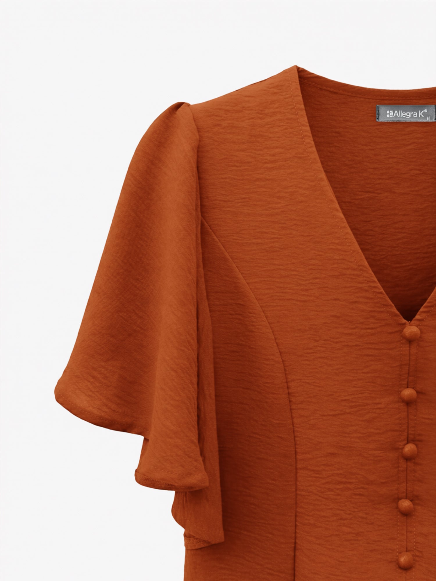 Brown - Women's rust orange short flutter sleeve blouse featuring a V-neckline, fabric-covered button front, and a tailored peplum waist, styled with blue jeans.