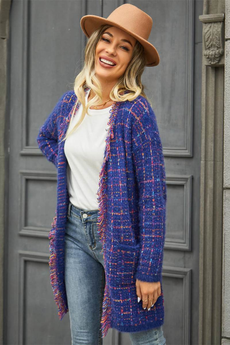 Blue - Women's longline open-front knit cardigan in a multicolored plaid pattern, featuring fringed trim and front patch pockets, styled with jeans and boots.