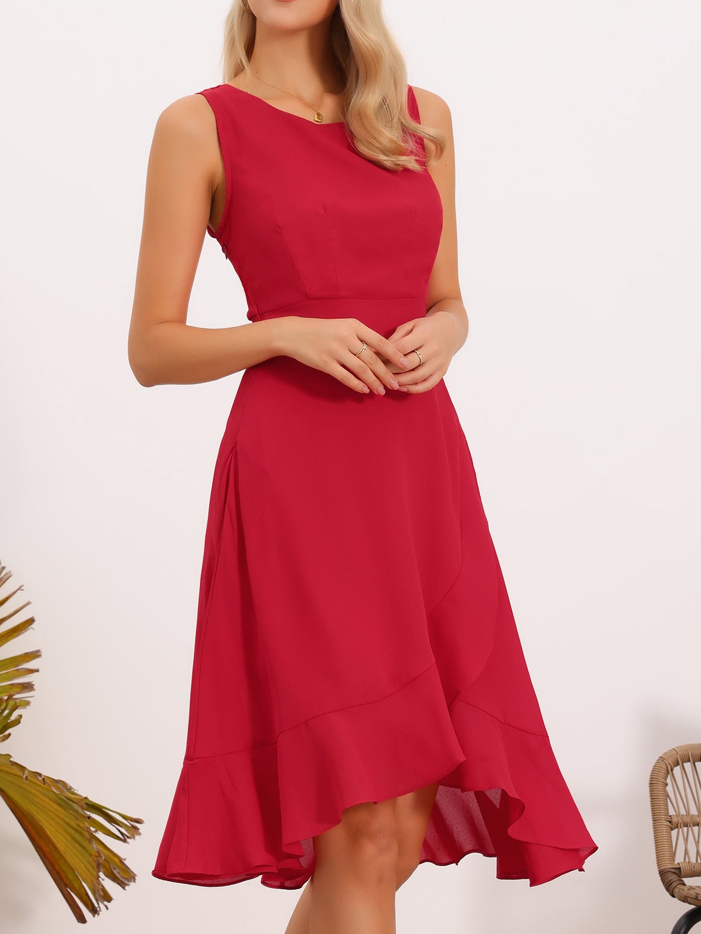 Red - Woman walking outdoors wearing a sleeveless floral chiffon midi sundress with an asymmetrical high-low ruffle hem.
