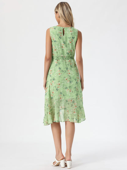 Green - Woman walking outdoors wearing a sleeveless floral chiffon midi sundress with an asymmetrical high-low ruffle hem.