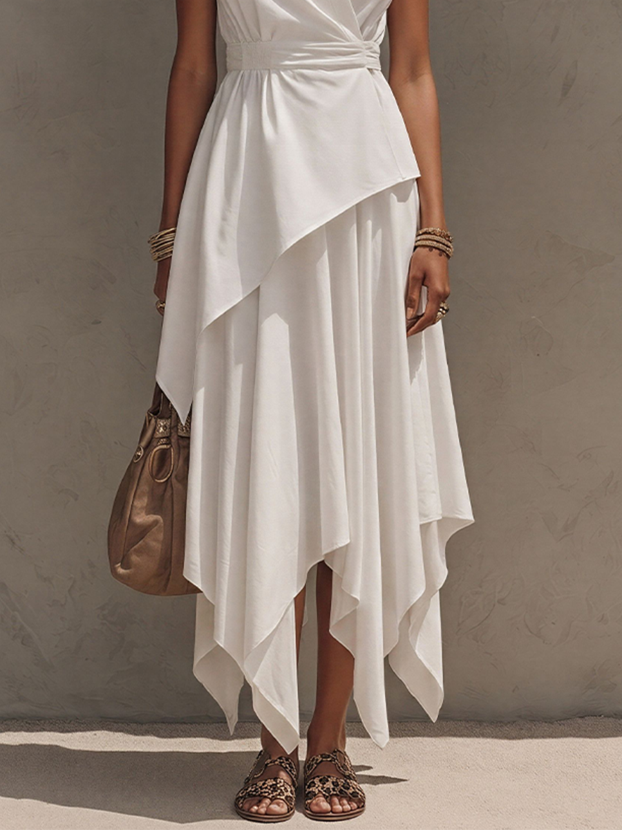 Off-White - Woman wearing a sleeveless, collared wrap midi dress with a cinched waist and asymmetrical handkerchief hemline.
