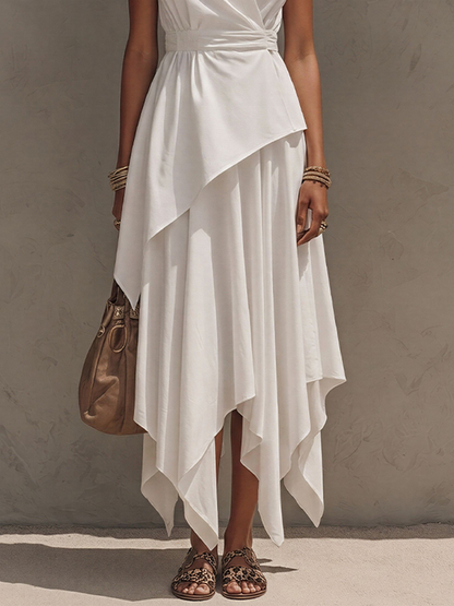 Off-White - Woman wearing a sleeveless, collared wrap midi dress with a cinched waist and asymmetrical handkerchief hemline.