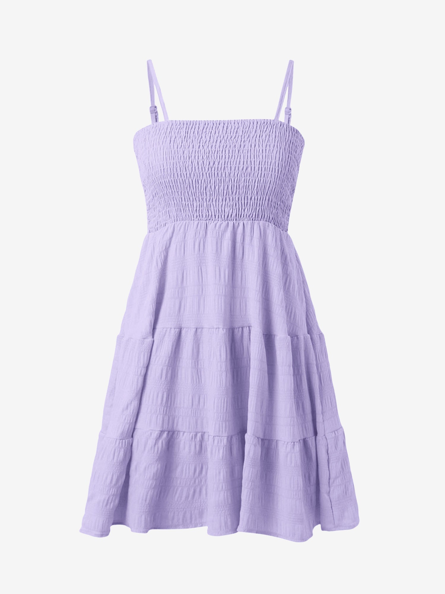 Light Purple - Woman wearing a textured smocked bodice mini dress with spaghetti straps and a tiered skirt