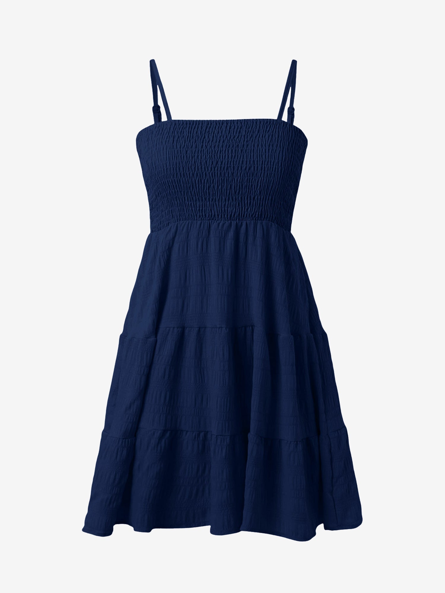 Navy Blue - Woman wearing a textured smocked bodice mini dress with spaghetti straps and a tiered skirt