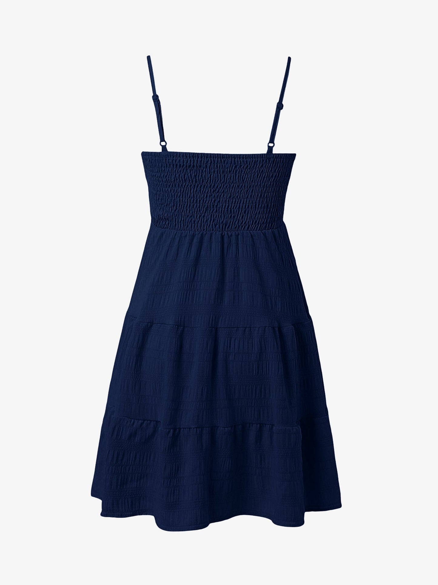 Navy Blue - Woman wearing a textured smocked bodice mini dress with spaghetti straps and a tiered skirt