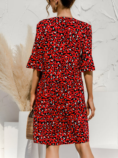 Red - Women's lightweight leopard print mini dress featuring a V-neckline with front ties, flared half sleeves, and a tiered skirt.