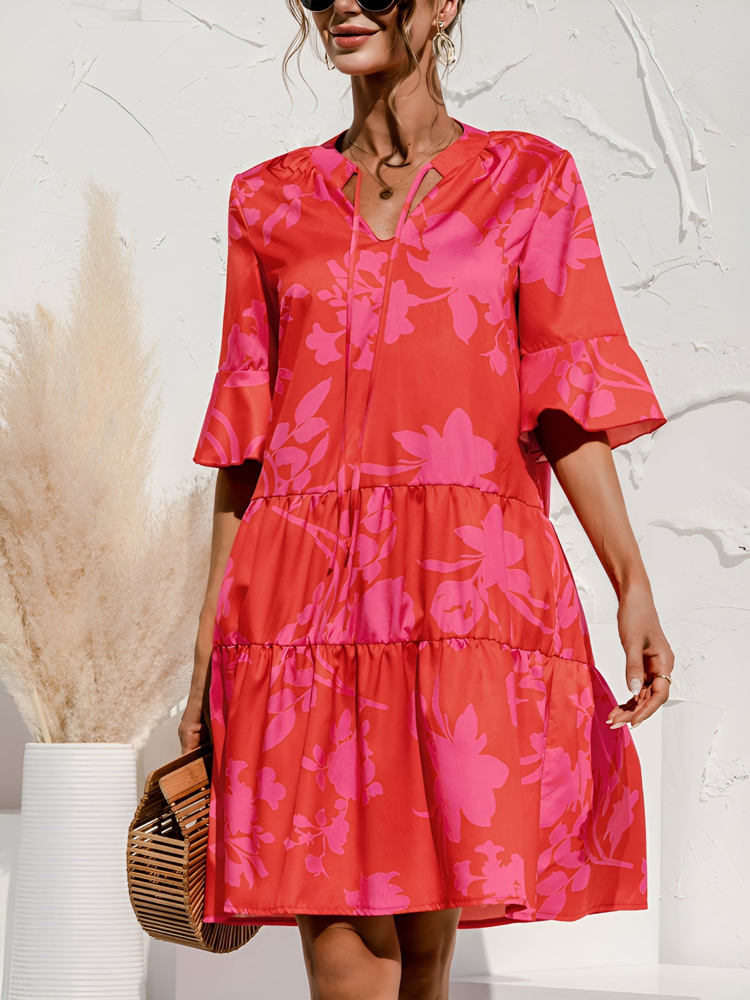 Rose Red - Women's lightweight leopard print mini dress featuring a V-neckline with front ties, flared half sleeves, and a tiered skirt.
