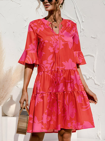 Rose Red - Women's lightweight leopard print mini dress featuring a V-neckline with front ties, flared half sleeves, and a tiered skirt.