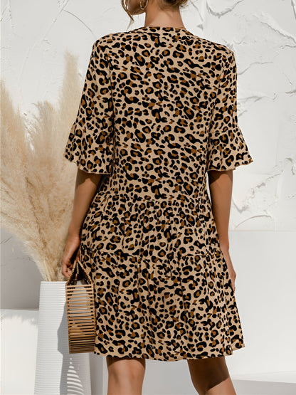 Leopard - Women's lightweight leopard print mini dress featuring a V-neckline with front ties, flared half sleeves, and a tiered skirt.