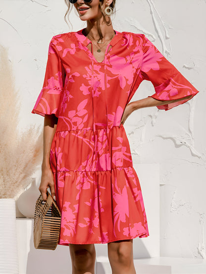 Rose Red - Women's lightweight leopard print mini dress featuring a V-neckline with front ties, flared half sleeves, and a tiered skirt.