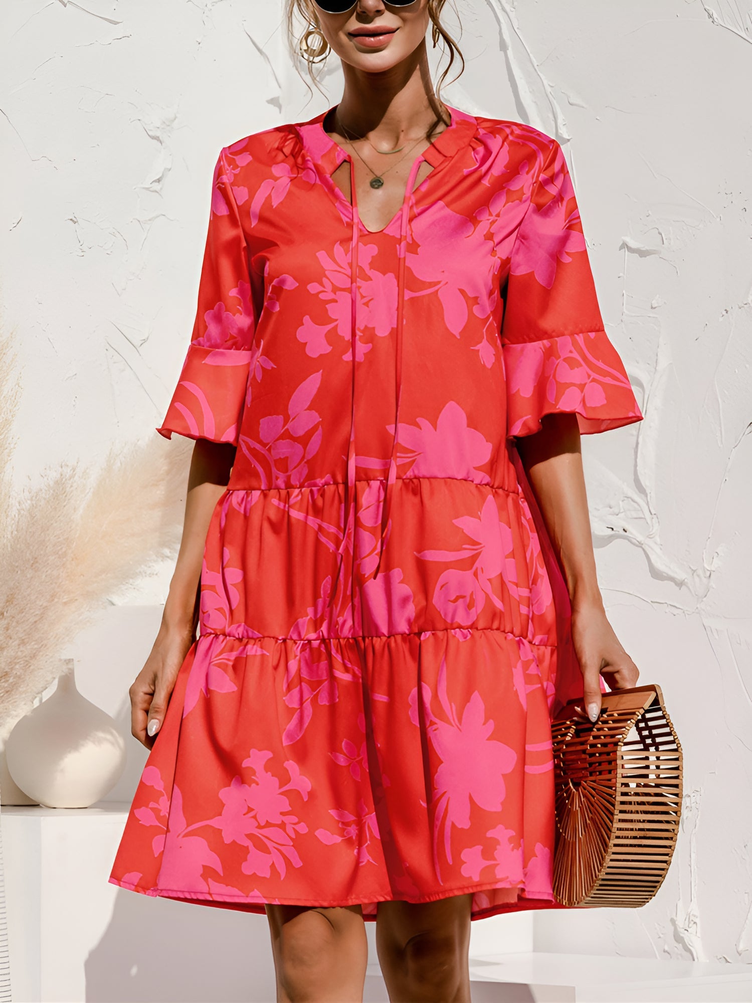 Rose Red - Women's lightweight leopard print mini dress featuring a V-neckline with front ties, flared half sleeves, and a tiered skirt.