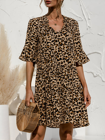 Leopard - Women's lightweight leopard print mini dress featuring a V-neckline with front ties, flared half sleeves, and a tiered skirt.