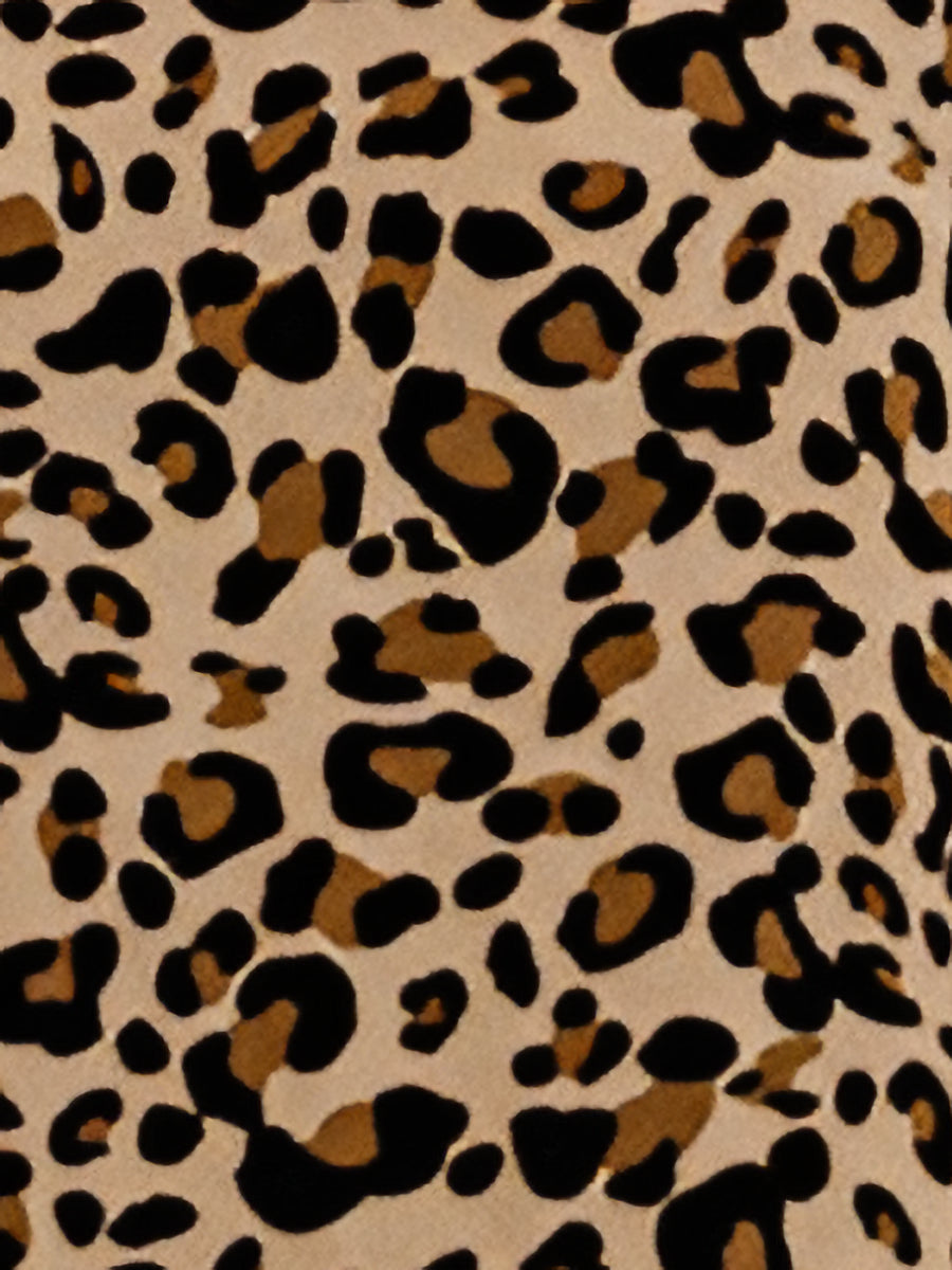 Leopard - Women's lightweight leopard print mini dress featuring a V-neckline with front ties, flared half sleeves, and a tiered skirt.
