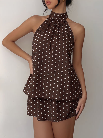 Coffee - Woman modeling a sleeveless halter neck mini dress with a polka dot print and blouson top