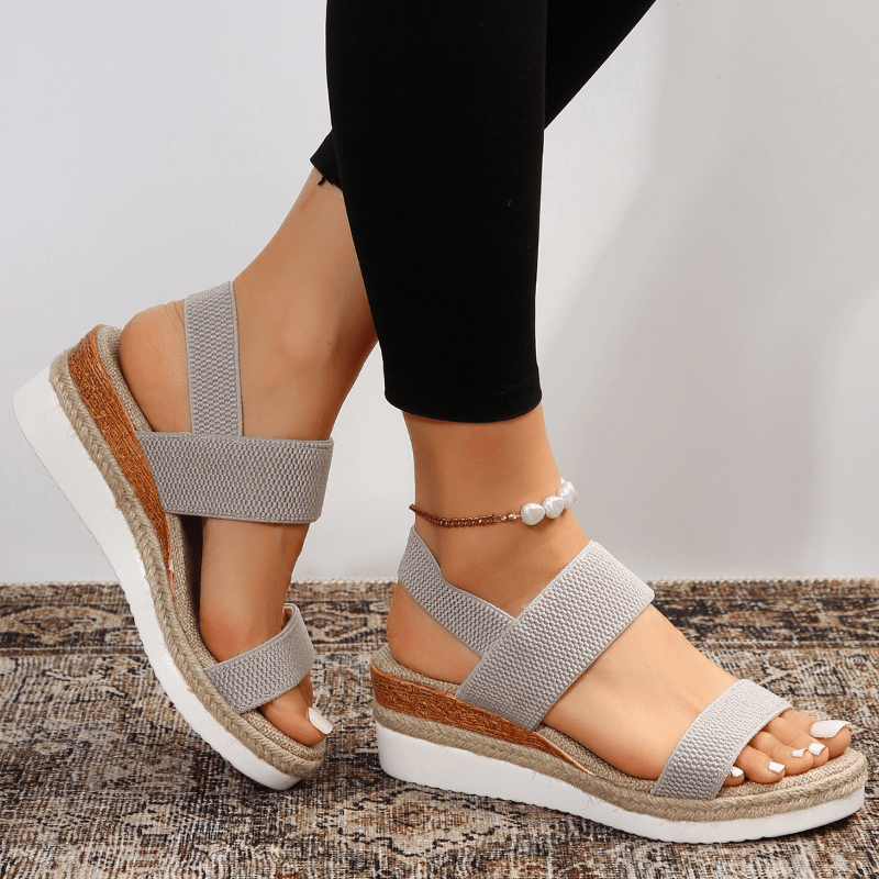 Grey - Women's open-toe platform sandals featuring woven elastic straps, a cushioned footbed, and espadrille jute trim on a thick shock-absorbing sole.