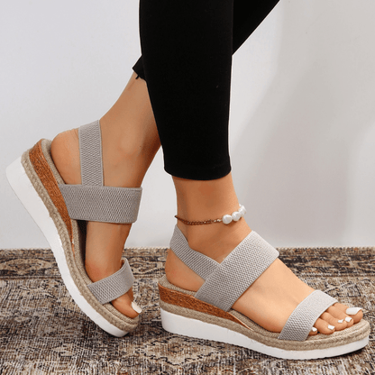Grey - Women's open-toe platform sandals featuring woven elastic straps, a cushioned footbed, and espadrille jute trim on a thick shock-absorbing sole.