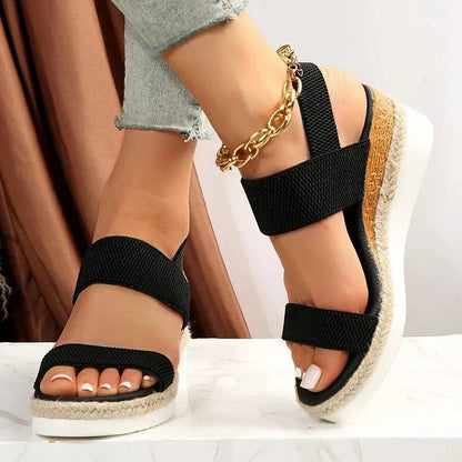 Black (Almost sold out) - Women's open-toe platform sandals featuring woven elastic straps, a cushioned footbed, and espadrille jute trim on a thick shock-absorbing sole.