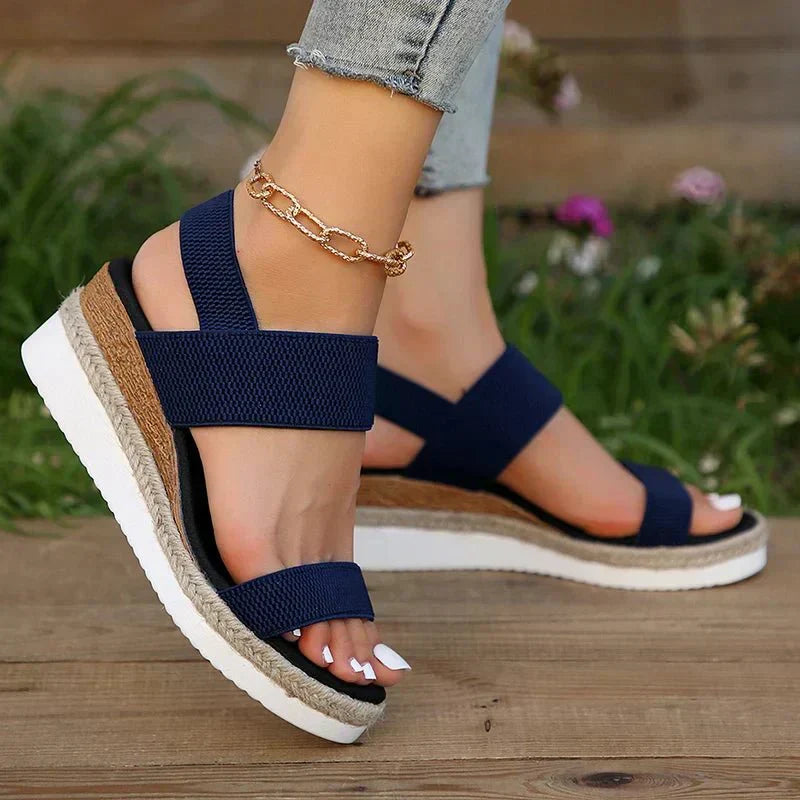 Pink - Women's open-toe platform sandals featuring woven elastic straps, a cushioned footbed, and espadrille jute trim on a thick shock-absorbing sole.