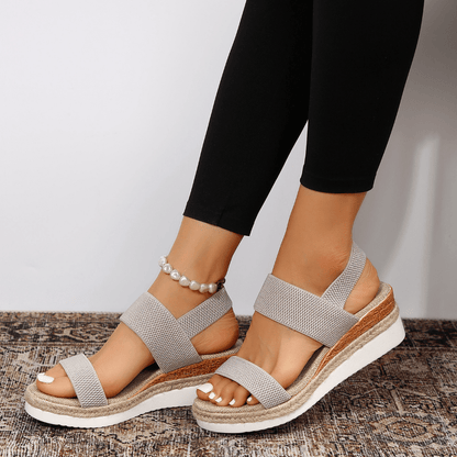 Pink - Women's open-toe platform sandals featuring woven elastic straps, a cushioned footbed, and espadrille jute trim on a thick shock-absorbing sole.