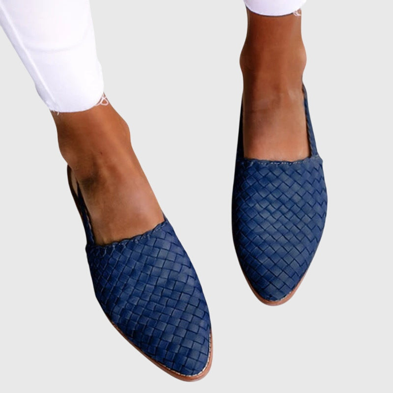 Blue - Women's woven faux-leather slip-on flat loafers featuring an almond toe and textured upper design.