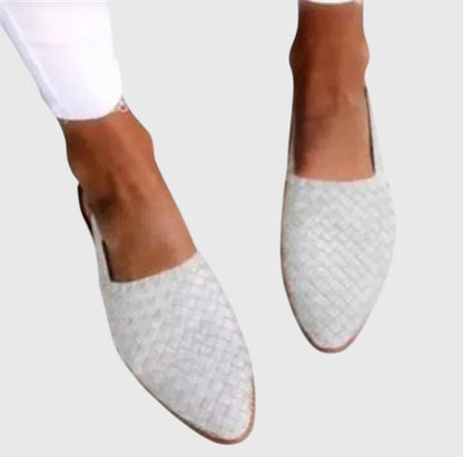 White - Women's woven faux-leather slip-on flat loafers featuring an almond toe and textured upper design.