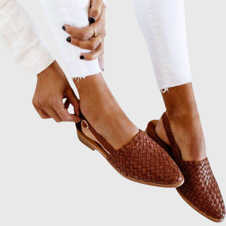 Brown - Women's woven faux-leather slip-on flat loafers featuring an almond toe and textured upper design.
