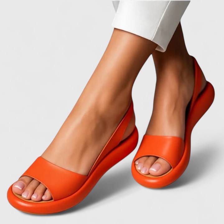 Orange - Faux-leather platform sandals featuring a wide front strap, open toe, and a continuous slingback strap on a thick cushioned sole.
