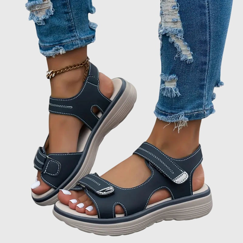 Blue - Women's faux-leather platform sandals featuring dual hook-and-loop adjustable straps, contrast stitching details, and a thick shock-absorbing sole.
